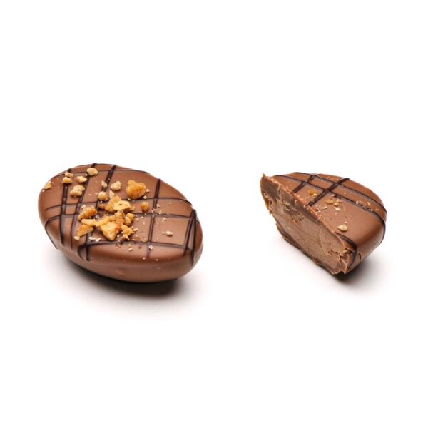 Half egg assortment - milk, dark stripes
